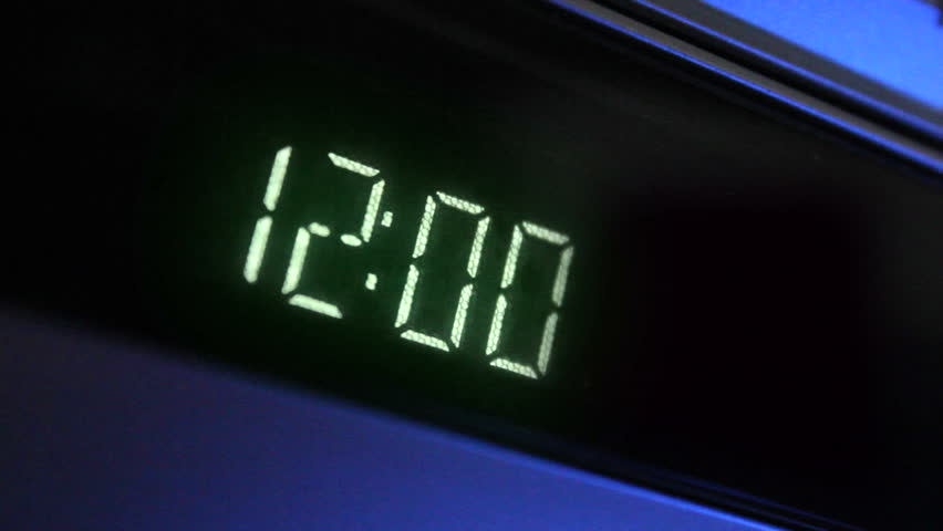 Digital clock flashing 12:00