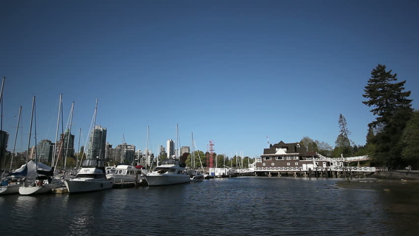 Vancouver's trendy False Creek Marina with recreational boats moored in the