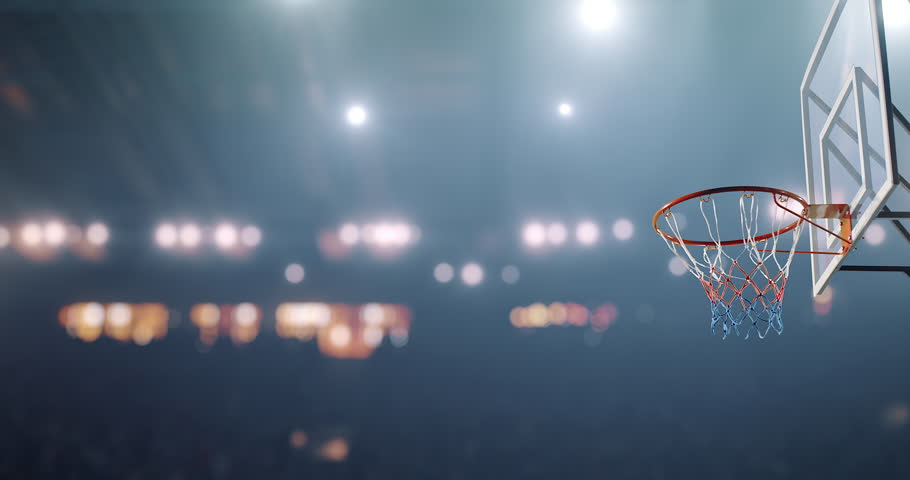 Close up image of professional basketball player making slam dunk during basketball game in floodlight basketball court. The player is wearing unbranded sport clothes. Royalty-Free Stock Footage #28198924