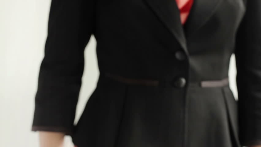 Businessman and businesswoman shaking hands, selective focus, on white