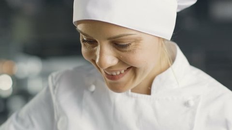 Professional French Baker Butters Croissants on a Tray. Shot on RED EPIC-W 8K Helium Cinema Camera.