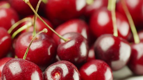 Appetizing red cherries. On the berries small drops of water Stock Video