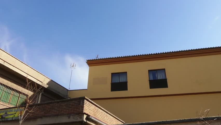 San Jose De Calasanz Parish on Alley of Los Basilio near Genil River in Granada. Granada is city in autonomous community of Andalusia, Spain, located at foot of Sierra Nevada mountains.