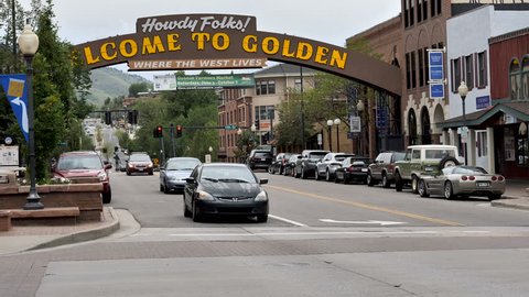 GOLDEN, COLORADO - JUNE 1, 2017 Memorial Day weekend traffic traveling along Main Street Golden, Colorado as the 2017 vacation travel season gets off to a busy start.