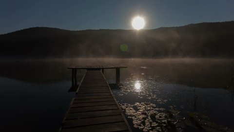 time-lapse clip autumn mist on the lake at night