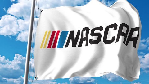 Waving flag with NASCAR logo. 4K editorial clip