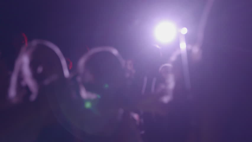 4k Blurry youth crowd dancing at a concert. Blue Purple color | Shutterstock HD Video #28229671