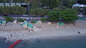 concrete wall protect erosion along the Pattaya beach, Chonburi, Thailand. - Powered by Shutterstock - Get 15% off with code: PIKWIZARD15