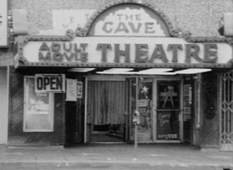 HOLLYWOOD, CALIFORNIA - OCTOBER 11:  Vintage editorial super 8 footage of The Cave XXX theater on Hollywood Blvd on October 11, 1988 in Hollywood California.  