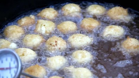 Hush-Puppies Bobbing While Cooking In Oil