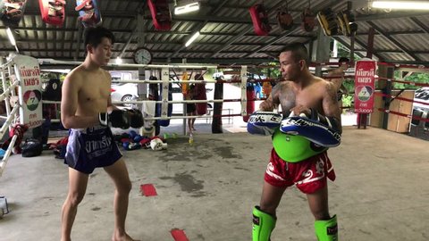 RAYONG, THAILAND – JUNE 27, 2017: Ancestors had taught and passed on this great legacy of Muay Thai to younger generations through a sacred tradition that captures the heart and soul of all Thais.