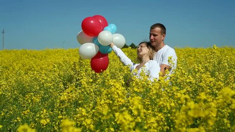 happy couple with balloons