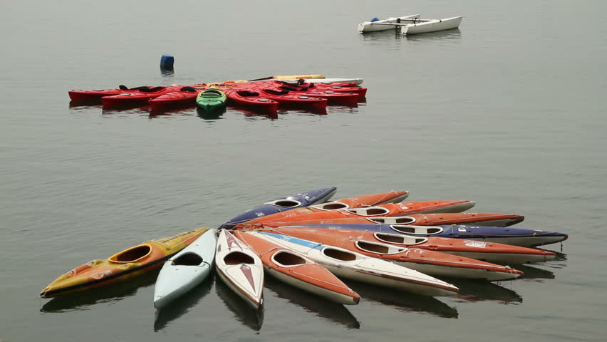 Rental canoes tied up at wharf