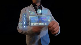 Man with a futuristic screen. The concept of the future interface on a transparent display - Powered by Shutterstock - Get 15% off with code: PIKWIZARD15