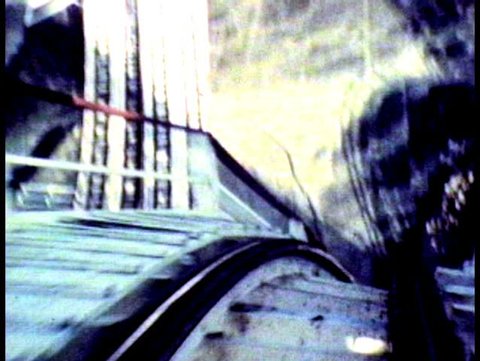 Vintage 1980's super 8 footage of roller coaster drop.