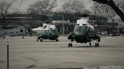 2010s: The President's Marine One helicopter takes off from a parking lot.