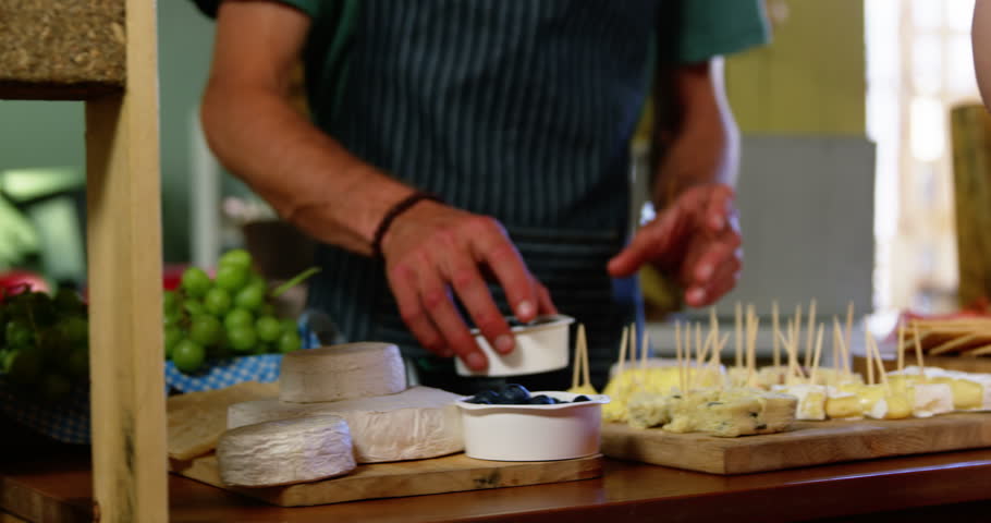 Woman talking on mobile phone in supermarket