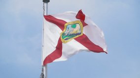 Florida State Flag waving in slow motion breeze 