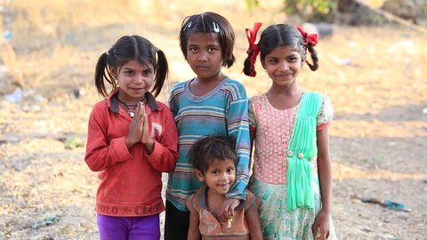 MANDU, INDIA - FEBRUARY 03, 2017 : An unidentified Indian poor children on the street . Poverty is a major issue in India