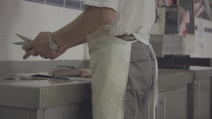 Fishmonger cleaning fish fast | Shutterstock HD Video #28324327