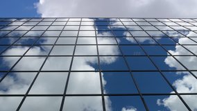 Looking up at Mirrored Building reflecting clouds. 4K timelapse. - Powered by Shutterstock - Get 15% off with code: PIKWIZARD15