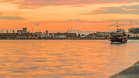 Port of Thessaloniki at Sunset Time, panning up, Timelapse