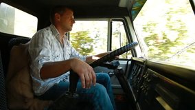 Lorry Driver at the Wheel of Truck