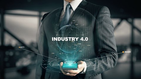 Businessman with Industry 4.0 hologram concept
