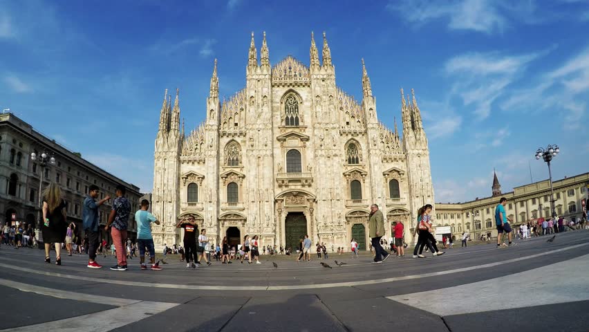 MILAN, ITALY - June 27, 2017: Tourist walking near Milan Cathedral Duomo Milano, 4K video, on June 27, 2017 in Milan, Italy. | Shutterstock HD Video #28344142