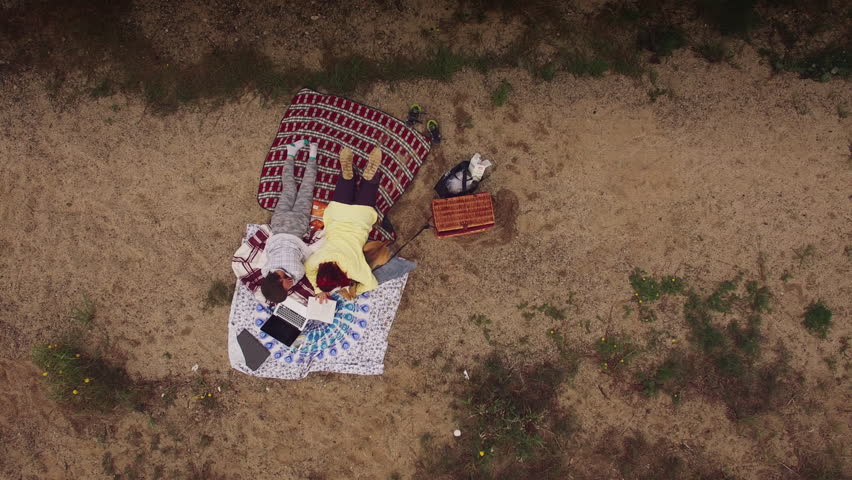 4k Aerial Family Having Picnic Next to the Lake