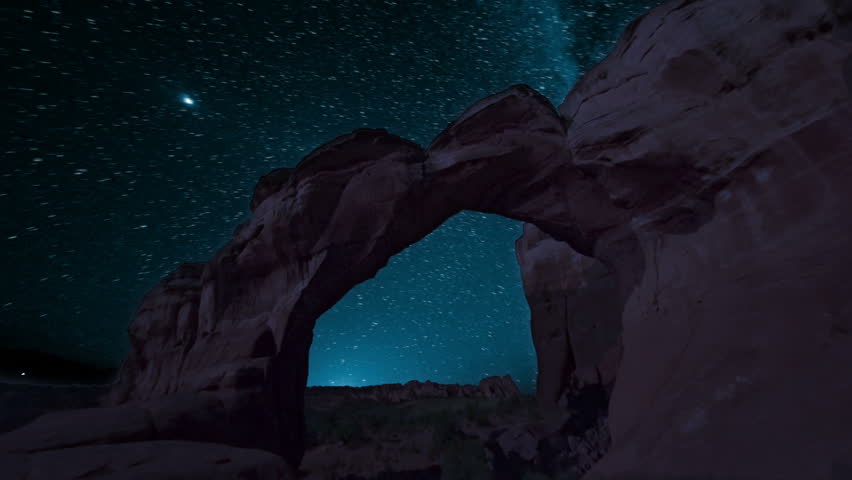 dawn breaking over rock arches Royalty-Free Stock Footage #28355722