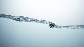 water wave and air bubbles - slow motion