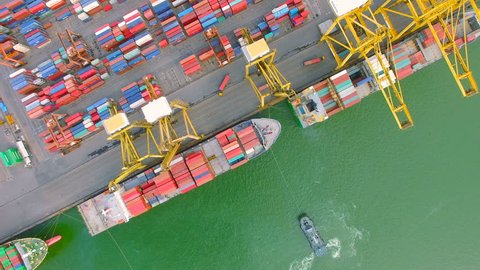 container cargo ship, import export, business logistic supply chain transportation concept for shipping aerial view 90 degree dolly tracking shot background, 4K