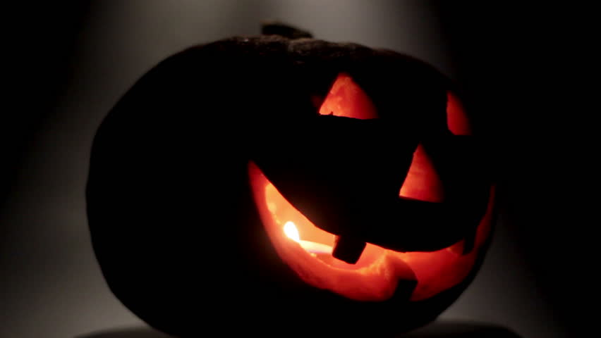 silhouette spinning pumpkin. halloween
