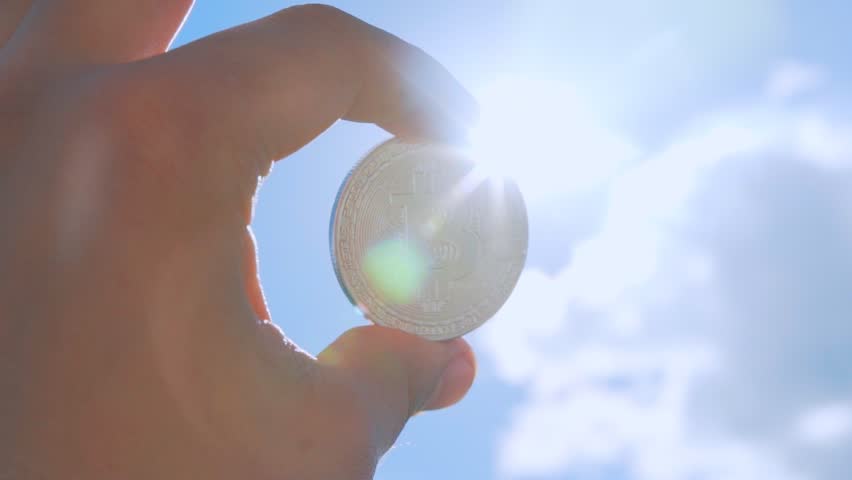 bitcoin on Sunny background Royalty-Free Stock Footage #28388194