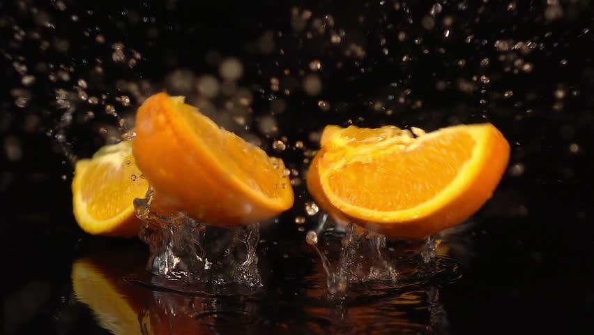 High quality video of falling quarter of orange in real 1080p slow motion 250fps