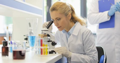 Young Asian Scientist Looking Through Microscope Stock Photo 1027528903 