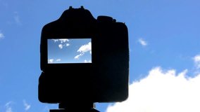 Short and beautiful timelapse of clouds inside photo camera. Tripod.