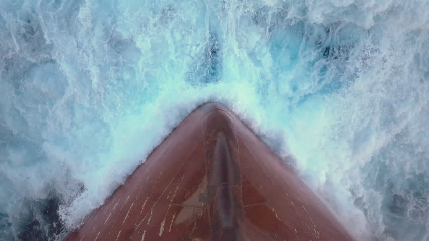 Splash of a sea wave against ship's bow. Royalty-Free Stock Footage #28402561