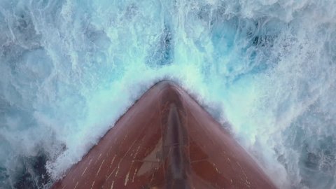 Splash of a sea wave against ship's bow.