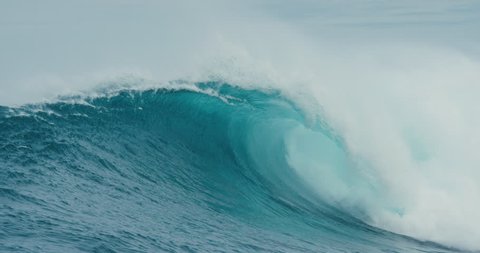 Giant Blue Ocean Wave Breaking in Slow Motion