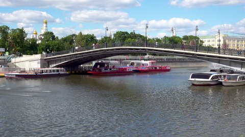 Moscow, Russia - June 26, 2017 Tourist boats under Luzhkov Bridge