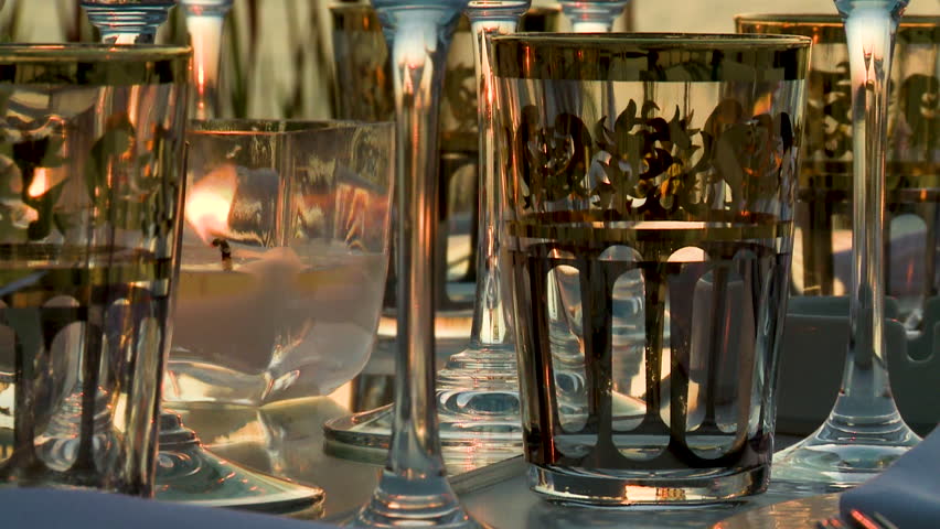 glases on tables at sunset