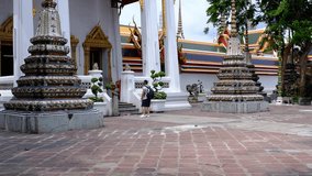 Time lapse Wat Pho stupas in Bangkok, Thailand. Wat Pho is also known as the temple which houses the big reclining buddha