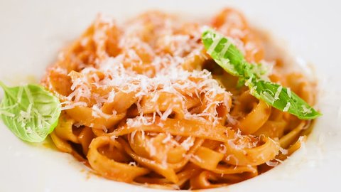 Wrapping Pasta with Bolognese Sauce Around a Fork