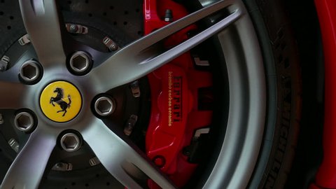 close up of Red Ferrari F430 Scuderia Front Wheel brake system with logotype. at Bangkok, Thailand, July 2017 ; editorial use only