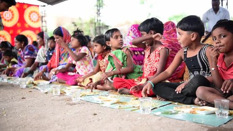 SALUNKWADI, INDIA \xD0 November 15, 2016: Community lunch in rural village Salunkwadi, Ambajogai, Beed, Maharashtra, India, South East Asia.