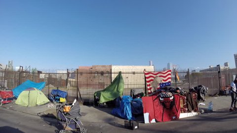 Los Angeles, California, USA - July 4, 2017:  Homeless tents along gritty downtown Skid Row streets.