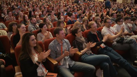 Novosibirsk Russia - May 20 2017: Listeners clap on learning conference or culture show. Leisure or convention for discussion. All seats are busy in large hall for look. Studying management of company