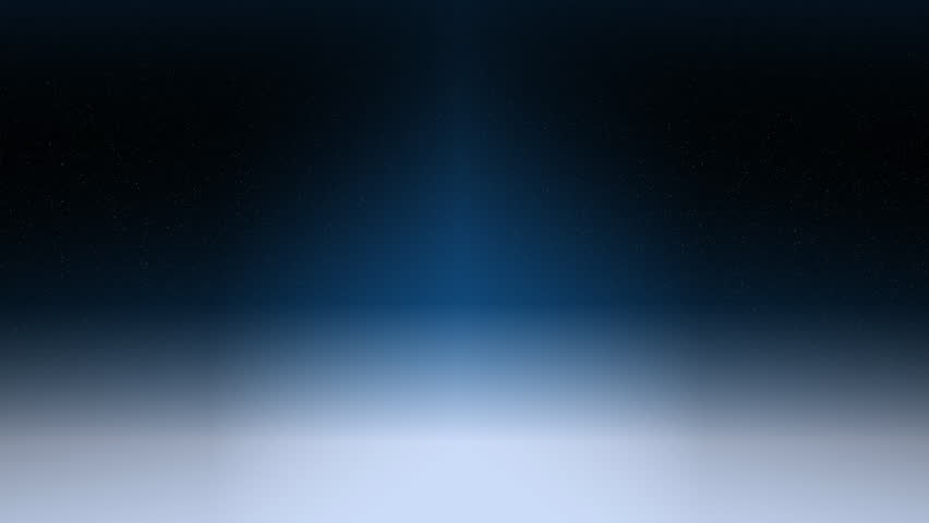 Snow begins to gently fall from a night sky.